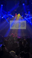 Paris nightclub packed with DJs performing under dramatic lighting