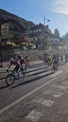 Mixed cycling group passes through a small Italian town