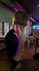 Young man dances at Saint Petersburg bar Friday night