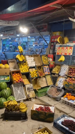 Evening street life: fruit markets and billiards in Kandahar