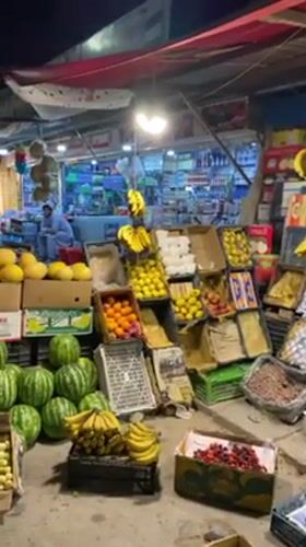 Evening street life: fruit markets and billiards in Kandahar