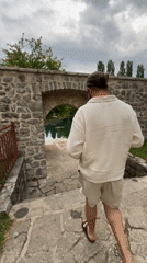 Tourist explores historic Trebinje mosques and architecture during afternoon walk