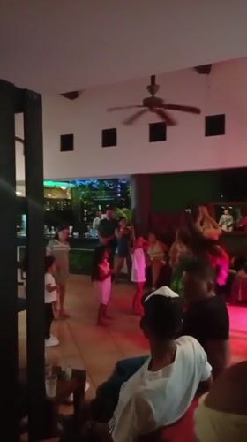 Dance performance with children at Venezuela beach resort