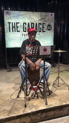 Cajón player mic'd up and ready in Karon, Thailand