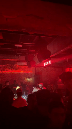 A night at a Kuala Lumpur club, red lights and all.