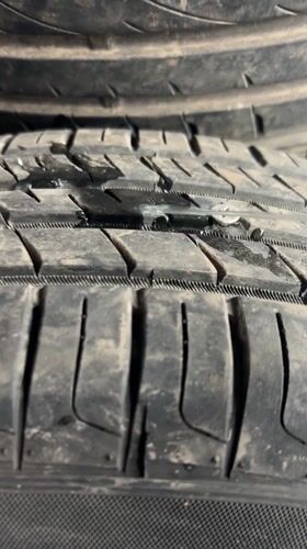 Tire puncture documented during leak inspection in Rutherglen