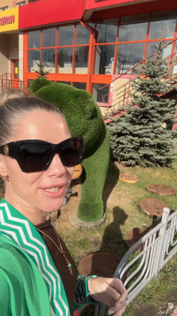 Woman documents tourist visit through Abakan, Russia landmarks