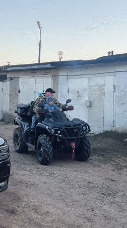 Families enjoy outdoor barbecue and ATV activities in Noviy, Russia