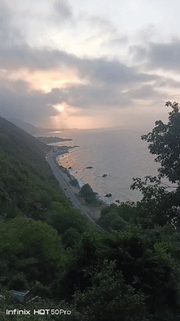 Sunset bonfire at a decorated coastal spot in El Tigrillo