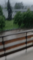 Hailstorm and heavy rain documented from residential balconies