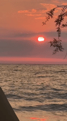 Sunset on a pebble beach in Bar, Montenegro