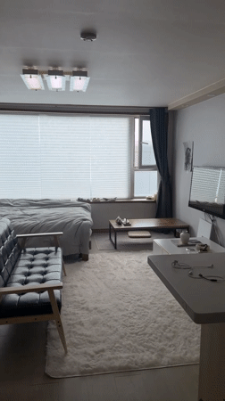 Sparse apartment interior documented in Seoul morning