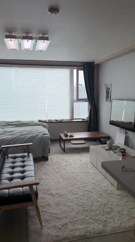 Sparse apartment interior documented in Seoul morning