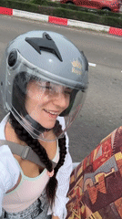 Woman passenger spotted on moped in Mũi Né