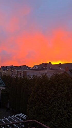 Dramatic sunset captured over Kaliningrad residential neighborhoods