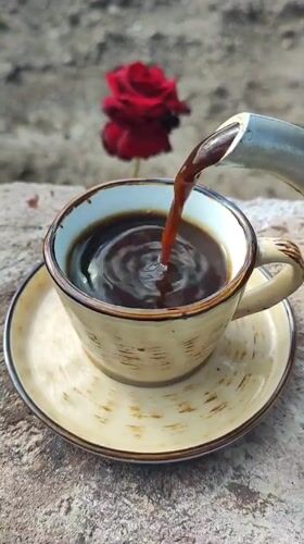Coffee and a red rose in a quiet Armenian morning moment