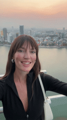 Tourist takes selfies at Đà Nẵng skyline viewpoints