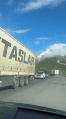 Turquoise truck spotted on mountain road in Gudauri, Georgia