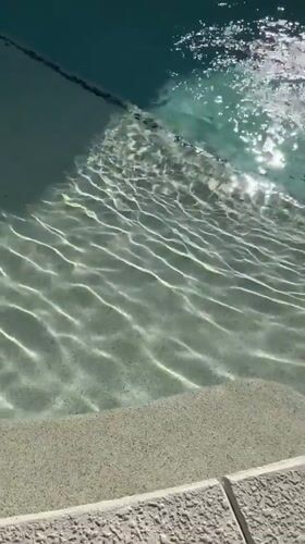 Swimming pool observed at Panama City Beach midday
