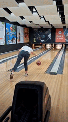 Bowling alley birthday session with neon lights and lane play