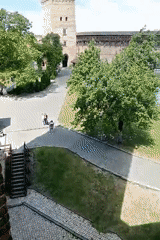 Tourist documents historic castle visit in Lutsk, Ukraine