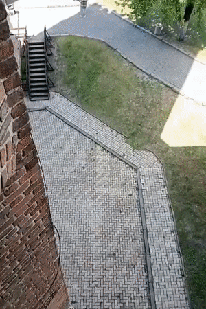 Tourist documents historic castle visit in Lutsk, Ukraine