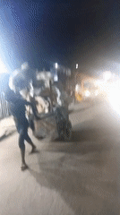 Nighttime street activity recorded in Isheri, Nigeria