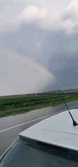 Rainbow appears over rural Bulgaria after rain showers