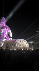DJ set and lit sculpture at outdoor night festival in Montenegro