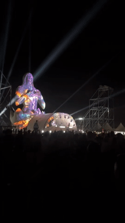 DJ set and lit sculpture at outdoor night festival in Montenegro
