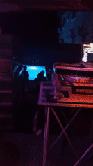 DJ performs nighttime set in Lokoja with colored lighting