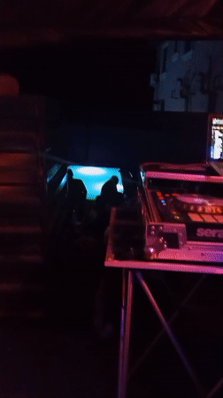 DJ performs nighttime set in Lokoja with colored lighting