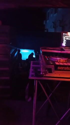 DJ performs nighttime set in Lokoja with colored lighting