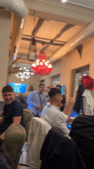 Evening diners gather at decorated restaurant in Burgas, Bulgaria