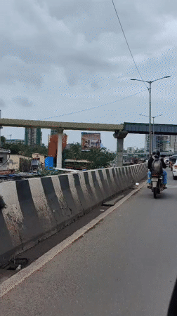 Morning motorcycle group ride through Mumbai streets
