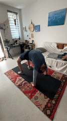 Man practices yoga in Đà Lạt apartment early morning