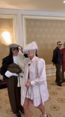 Fashion show held in ornate Kyiv hall showcases designer dresses
