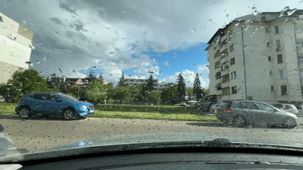 Rainy afternoon street scenes documented in Pernik, Bulgaria
