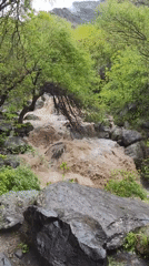 Visitors document natural sites and ancient stone structures in Goght, Armenia