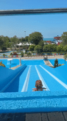 Summer morning water park activities in Nebug, Russia