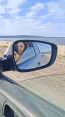 Driver records waterfront journey near Chaikovsky, Russia