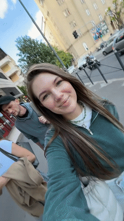 Woman records cheerful selfie video on sunny day in Belgrade