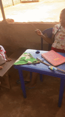 Teacher leads classroom activities with young students in rural Nigeria