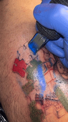 Tattoo session and flag hanging witnessed in Buenos Aires