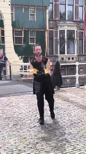 Street performers, flower markets enliven historic Alkmaar on Sunday afternoon