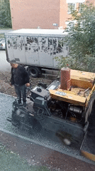 Road work and a resting dog — two quiet Votkinsk moments