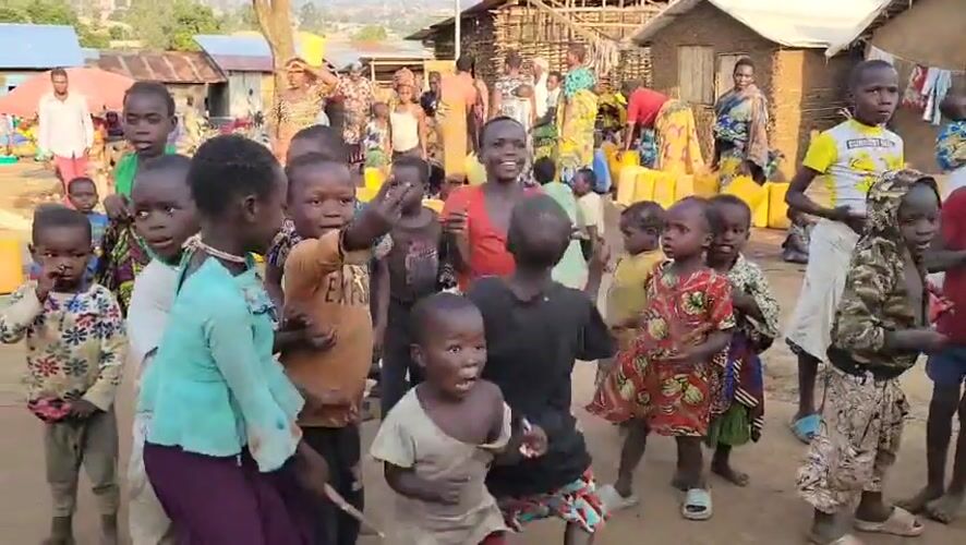 Community gathering and market activity in Bunia, DRC