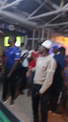 Evening social gathering captured at Nairobi bar with pool