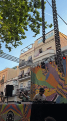 Outdoor DJ street party draws crowds in Barcelona plaza