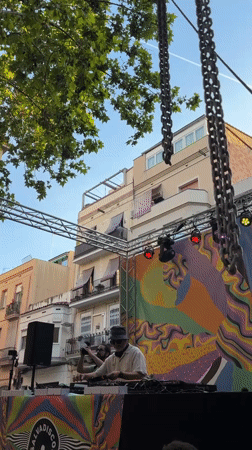Outdoor DJ street party draws crowds in Barcelona plaza